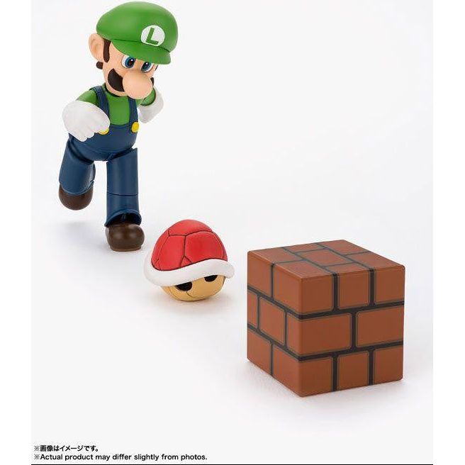 S.H.Figuarts Luigi kicking a red shell beside a brick block